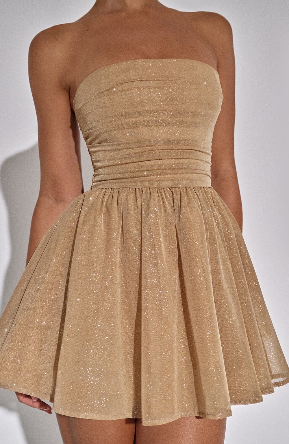 Beyond Chic | Back-Knot Strapless Glitter Mini Dress