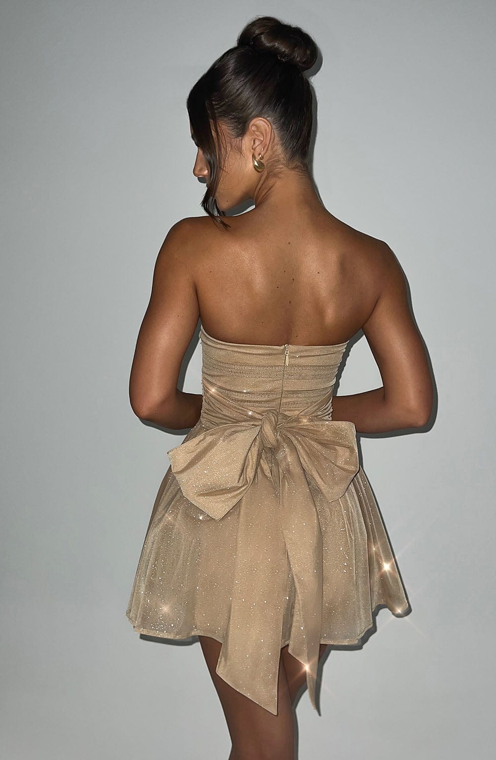 Beyond Chic | Back-Knot Strapless Glitter Mini Dress